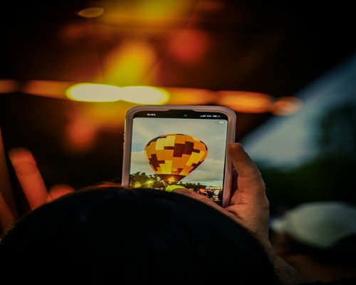 Smartphone displaying the fictional Pixel Crown Sprint game on PixelCrownArena Australia